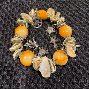 Boho Chic Shell & Gemstone Charm
Bracelet